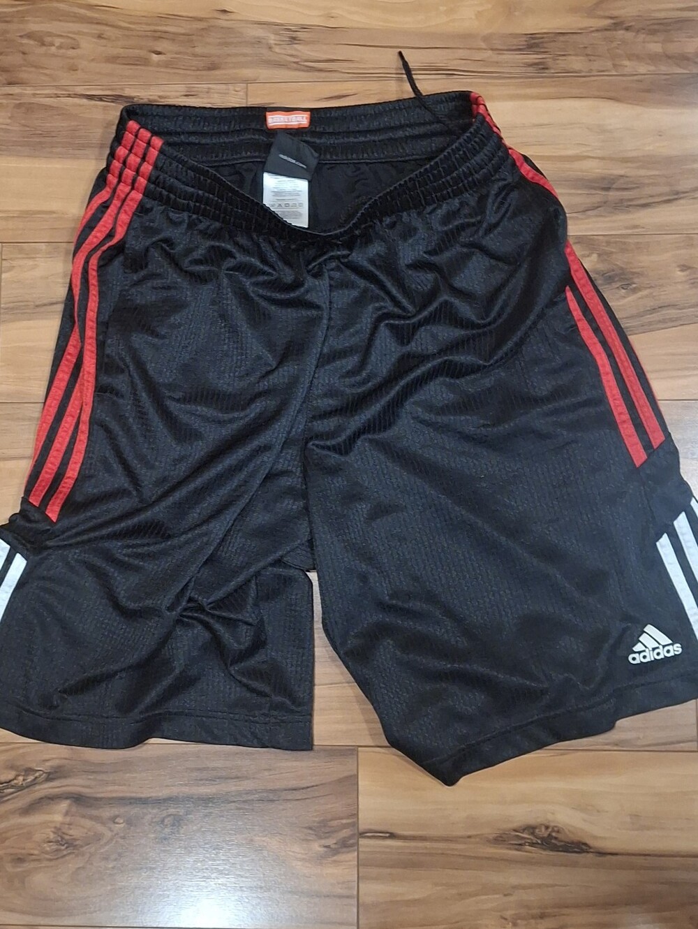 Adidas Men’s Size Medium Black Athletic Shorts with Red Side Stripes
